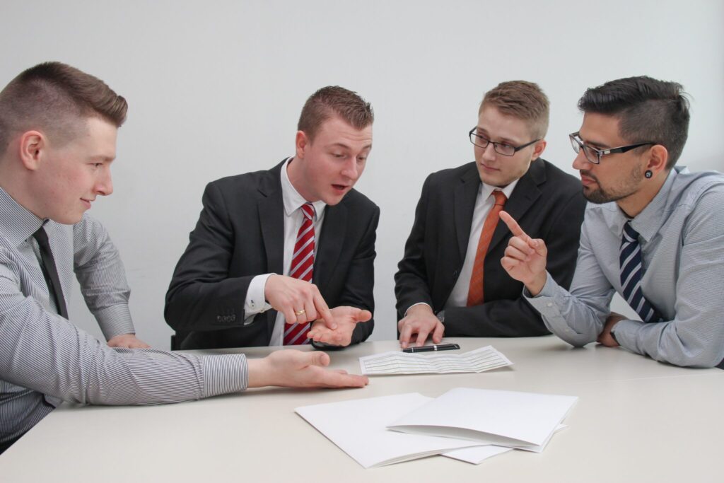4 men arguing